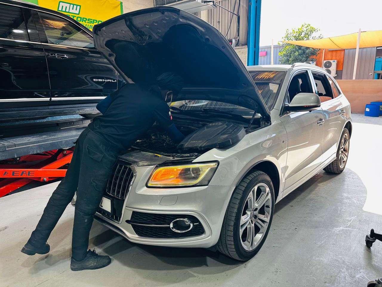 Audi car being serviced by EBC Express Dubai 